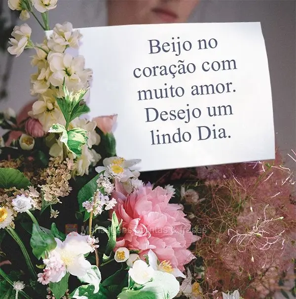 Beijo no coração com muito amor.  Desejo um lindo Dia.